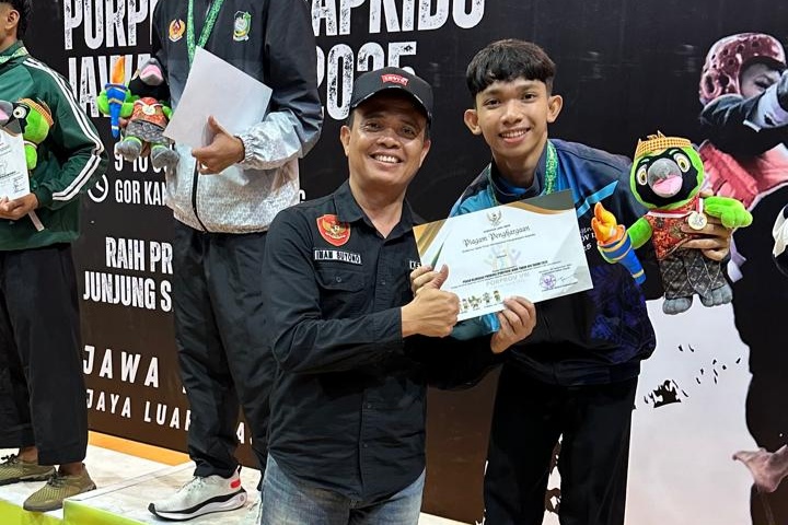 1000809482 Atlet Hapkido Kabupaten Mojokerto Dwi Jay Andika meraih medali perunggu di nomor 58 Kg putra Porprov Jatim IX.