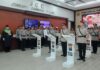 Kapolres Jombang saat memimpin upacara Sertijab diruang JCC Polres Jombang./bongkah.id/Karimatul Maslahah/
