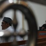 Eko Fitrianto saat duduk di kursi persidangan PN Jombang./bongkah.id/Karimatul Maslahah/