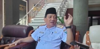 Sekdakab Jombang Agus Purnomo saat dimintai keterangan./bongkah.id/Karimatul Maslahah/