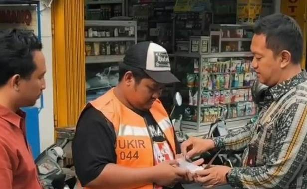 Jukir Sidoarjo didefinisikan sebagai penjaga keteraturan ruang publik, tak sekadar penarik karcis retribusi.